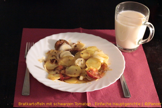 Bratkartoffeln mit schwarzen Tomaten - Hauptgerichte