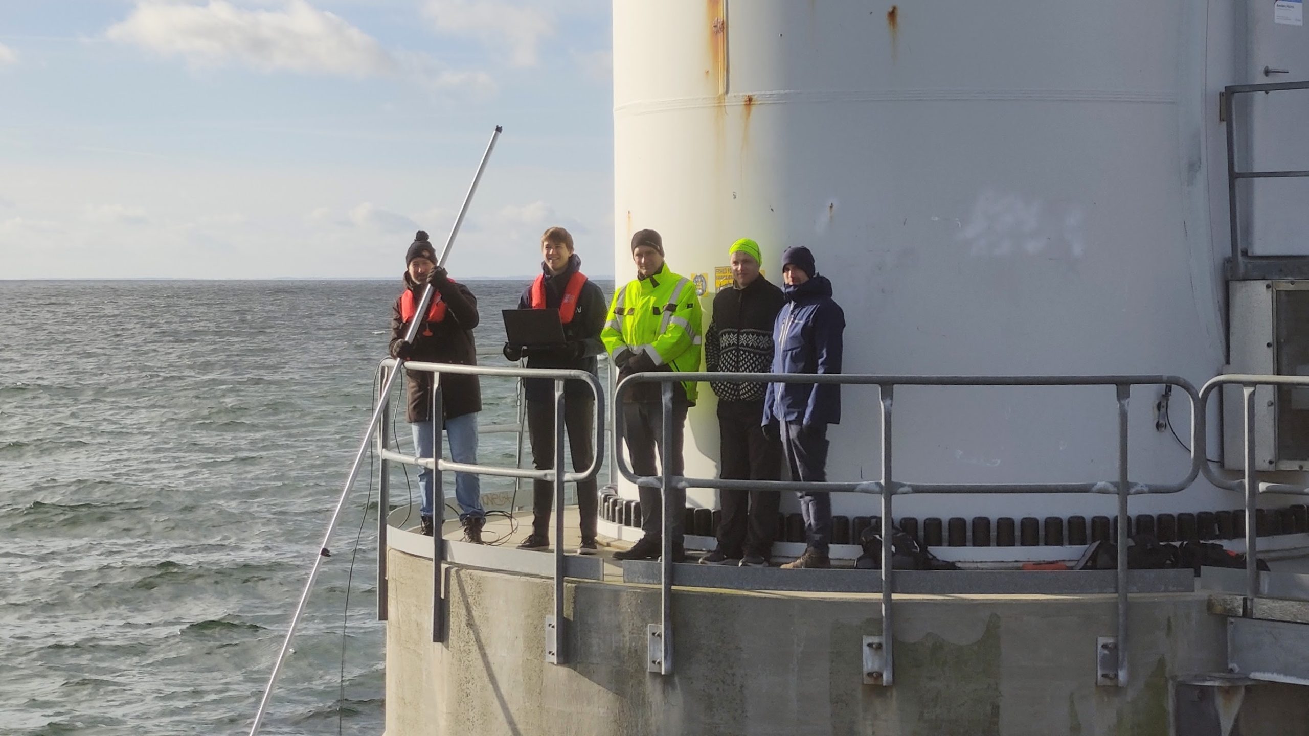 Operator holding a pole with the UVision 3D underwater scanner mounted on the end. The scanner can be handheld as in the photo, mounted to an ROV, or used on the end of a pole.