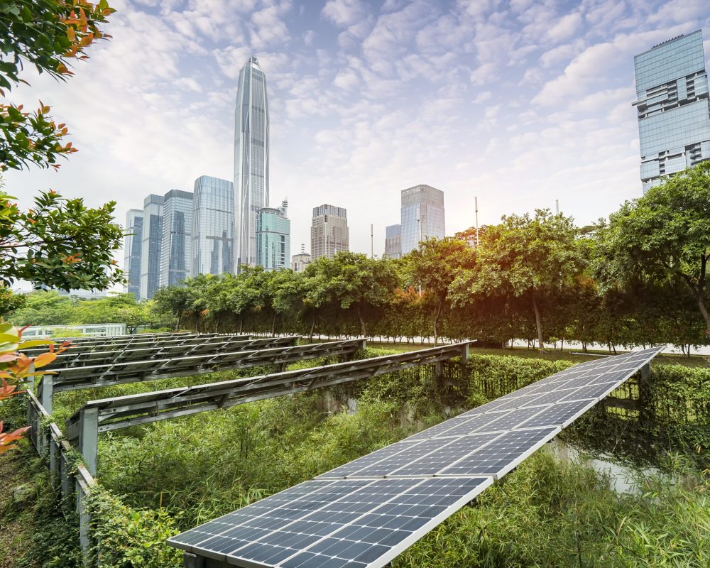 Ecological energy renewable solar panel plant with urban landscape landmarks