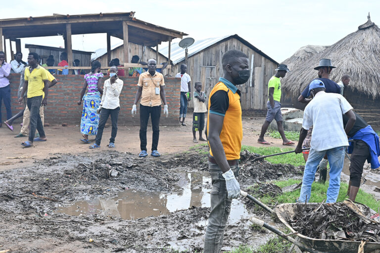 cleaning operations to remove plastic debris and polythene bags from a fishing community on Lake Albert