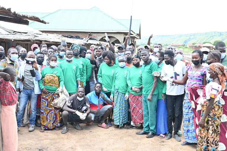 cleaning operations to remove plastic debris and polythene bags from a fishing community on Lake Albert