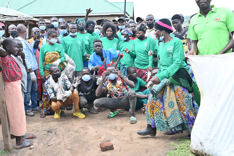 cleaning operations to remove plastic debris and polythene bags from a fishing community on Lake Albert