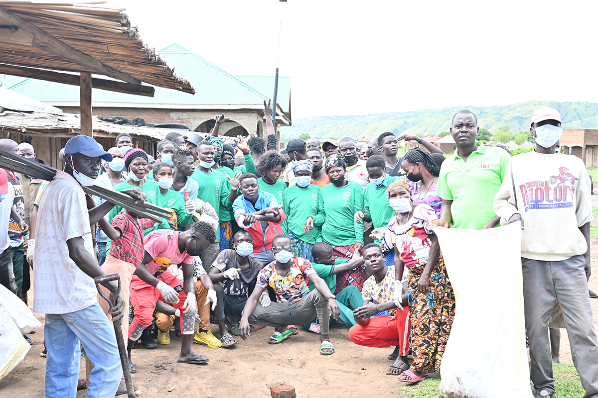 cleaning operations to remove plastic debris and polythene bags from a fishing community on Lake Albert