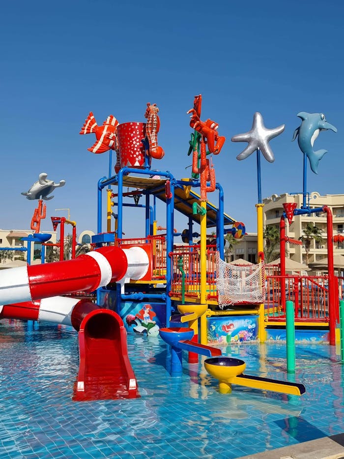 Bright water park with slides and pools in Hurghada, Egypt offering fun summer activities for children.