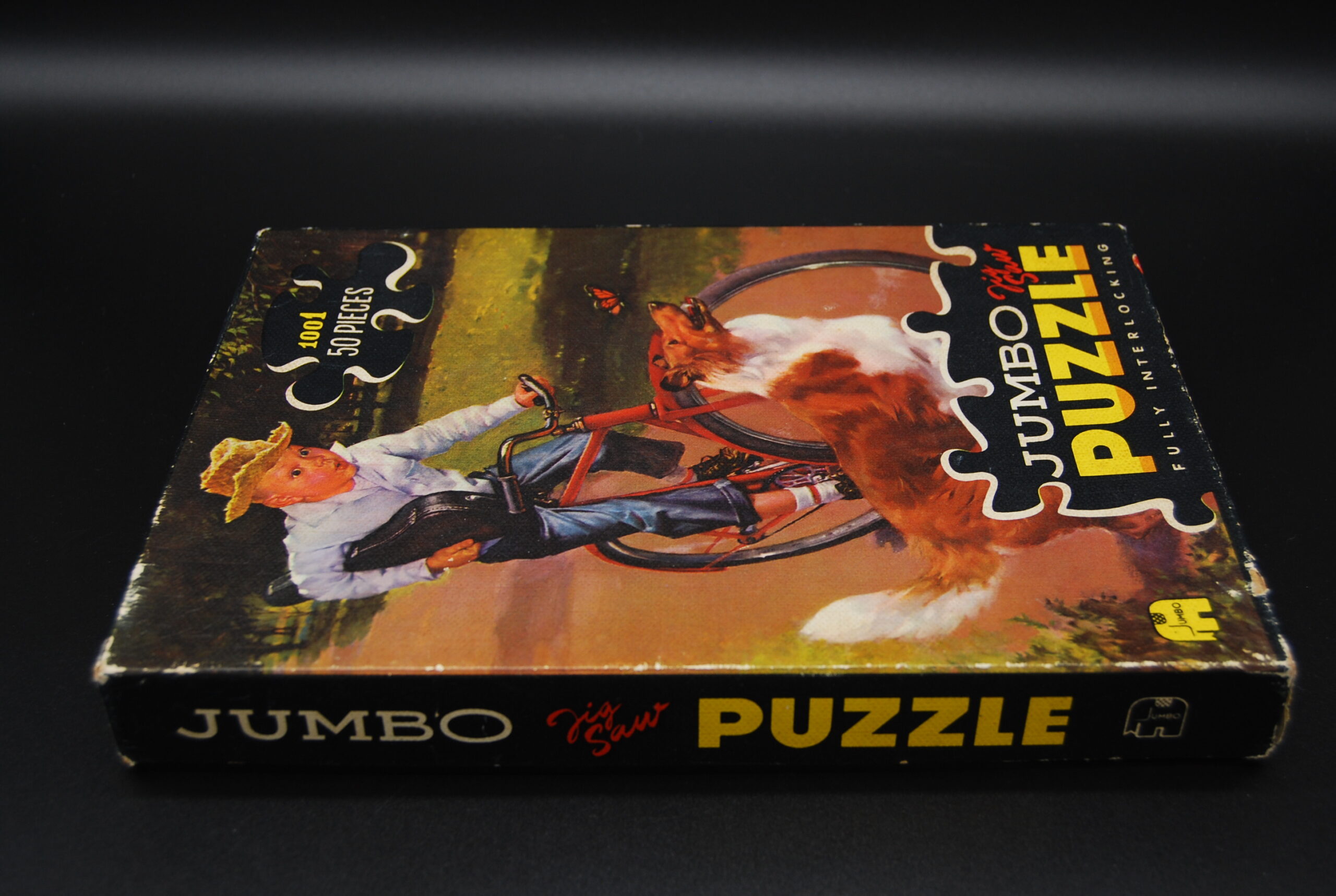 Vintage puzzel Jumbo fietsende jongen-hond|What's New Today?