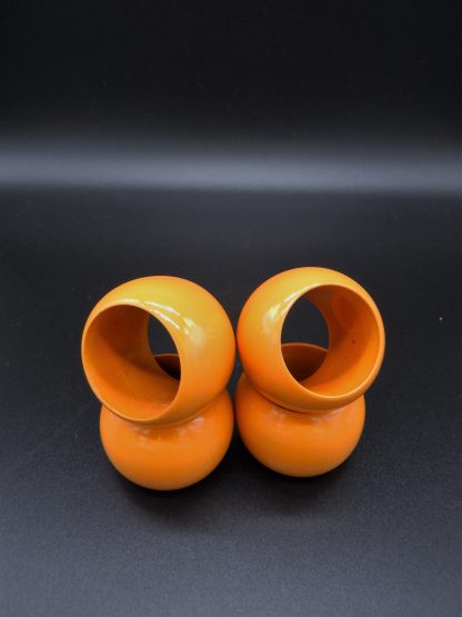Glanzende houten servet ringen oranje