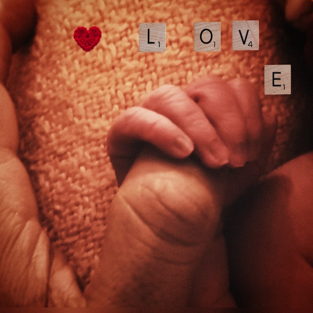 photo of Pedro and daughter hand