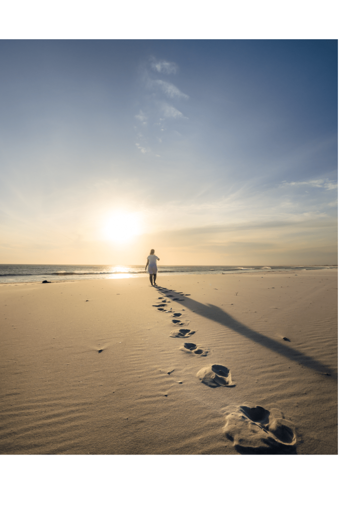 foot steps on sandy beach