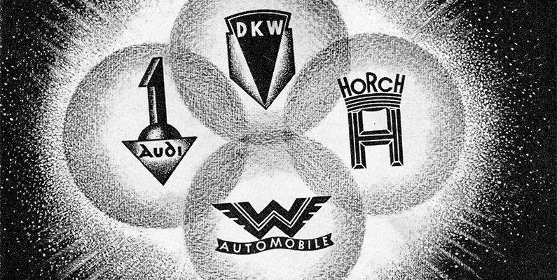 De fyra ringarna i biltillverkarens logotyp representerar de fyra ursprungliga bilföretagen som slogs samman för att bilda Auto Union, föregångaren till dagens Audi AG. Dessa fyra företag var Audi, DKW, Horch och Wanderer. Logotypen med de fyra ringarna antogs för att symbolisera enheten mellan dessa fyra bilmärken inom Auto Union. Efter fusionen av dessa företag användes den fyrringade logotypen och den har sedan dess förblivit en ikonisk symbol för Audi som ett varumärke.