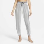 Joggingbyxor av fleece Nike Yoga Luxe i 7/8-längd för kvinnor - Grå
