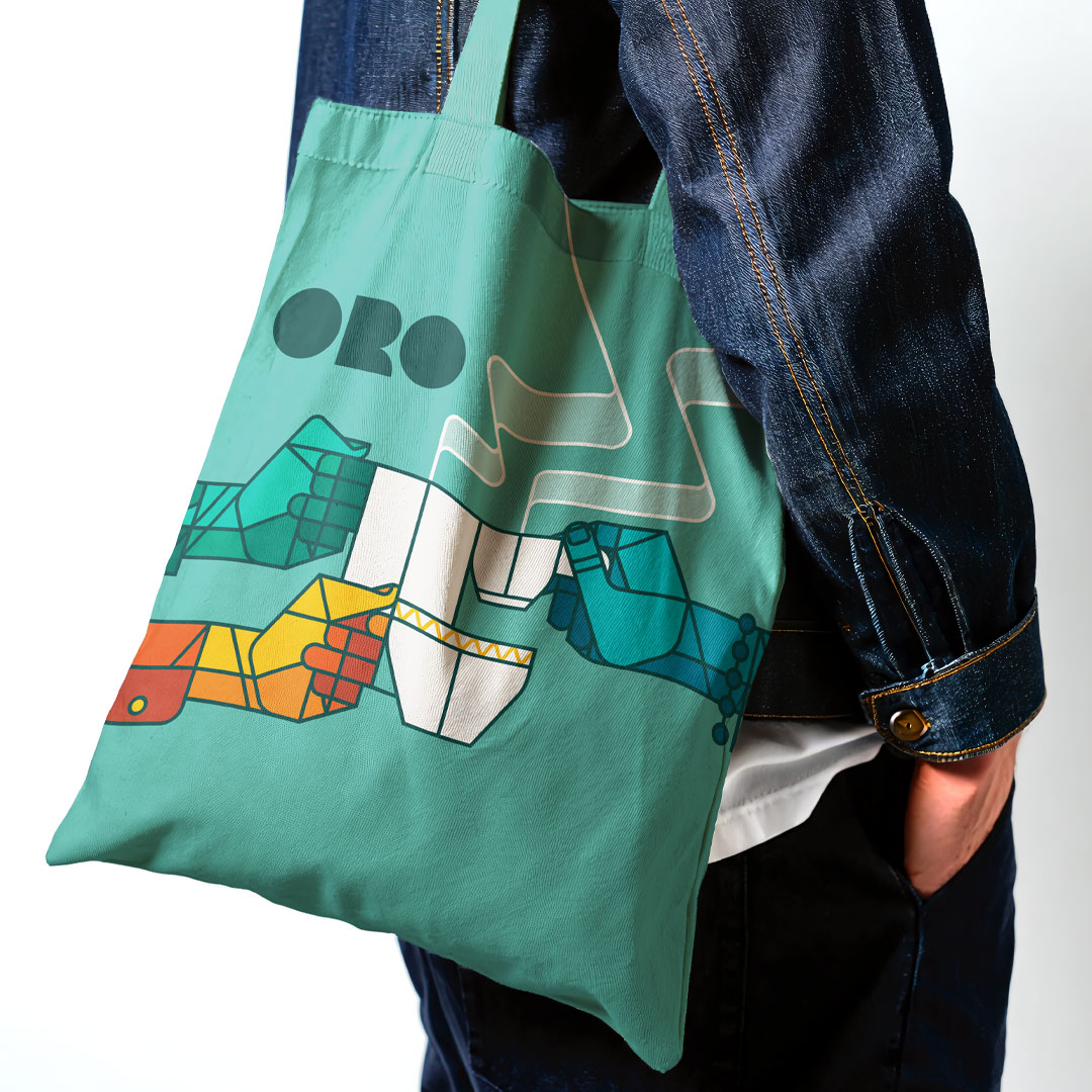 ORO branded tote bag designed by Bart De Keyzer featuring geometric coffee illustrations and contemporary visual branding. Lifestyle merchandise concept created by a freelance graphic designer and illustrator specialized in branding, packaging design, and illustration systems.