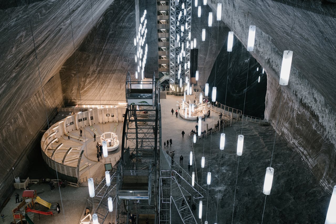 Salt mine entertainment park with hanging LED lamps and various attractions