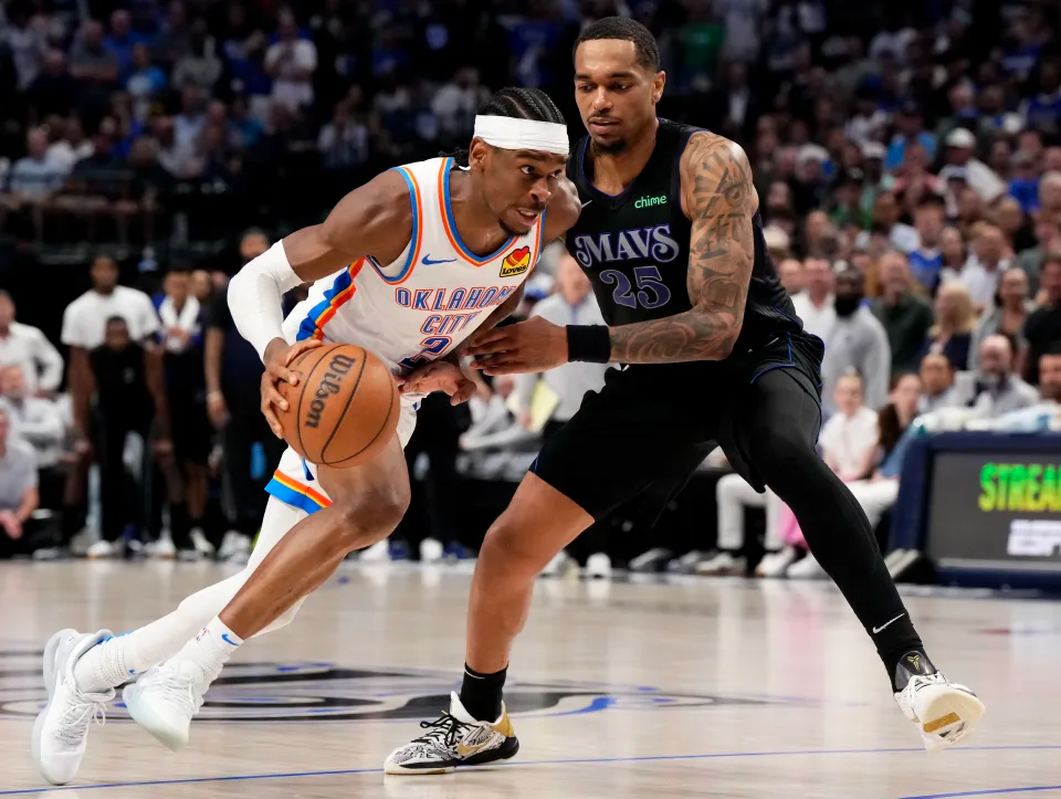 DALLAS, TEXAS - MAY 18: Shai Gilgeous-Alexander #2 of the Oklahoma City Thunder is defended by P.J. Washington #25 of the Dallas Mavericks during the second half of Game Six of the Western Conference Second Round Playoffs at American Airlines Center on May 18, 2024 in Dallas, Texas. NOTE TO USER: User expressly acknowledges and agrees that, by downloading and or using this photograph, User is consenting to the terms and conditions of the Getty Images License Agreement. (Photo by Sam Hodde/Getty Images)