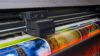 Large format printing machine in operation. Industry