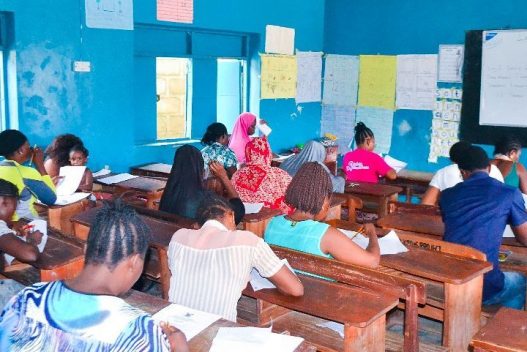 Students in classroom, learning english and business skills, Nigeria