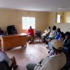 Meeting between coaches and Kenyan villagers, participants of Action10 program, Kenya.