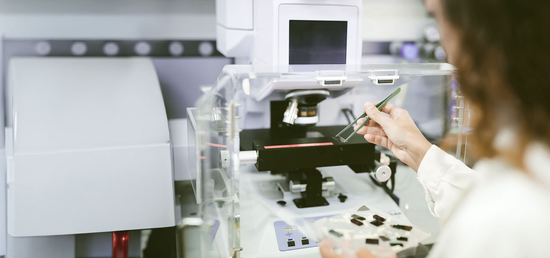 female-scientist-using-spectrophotometer
