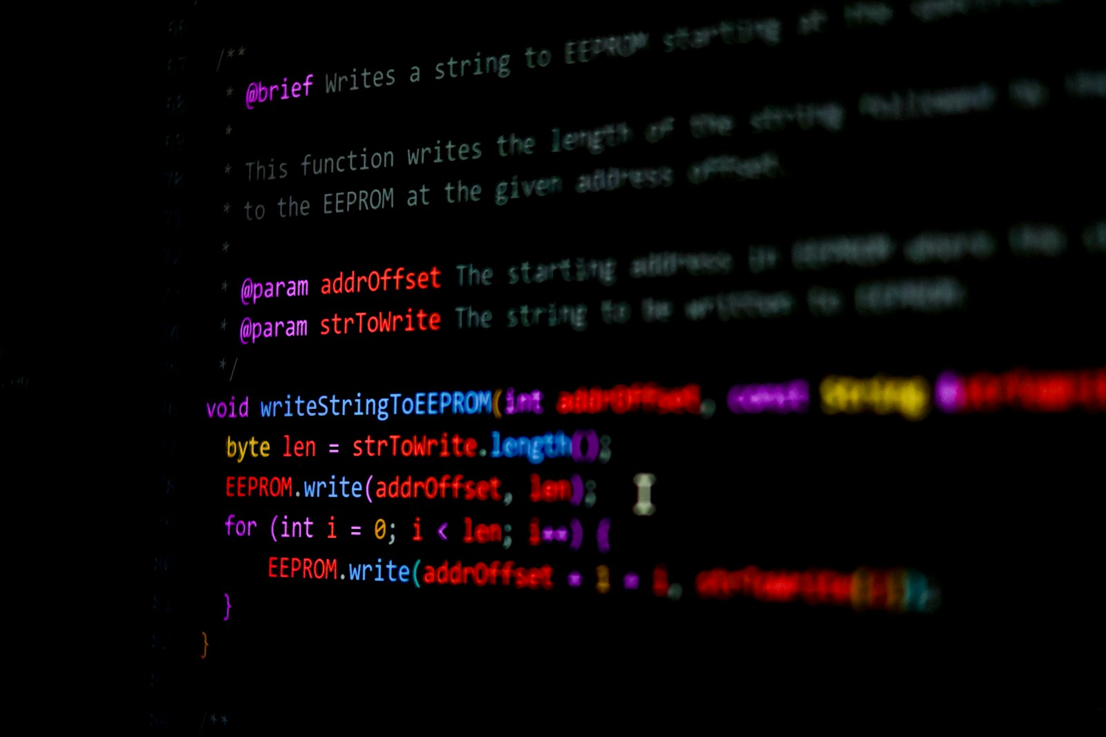 Code appears on a screen.