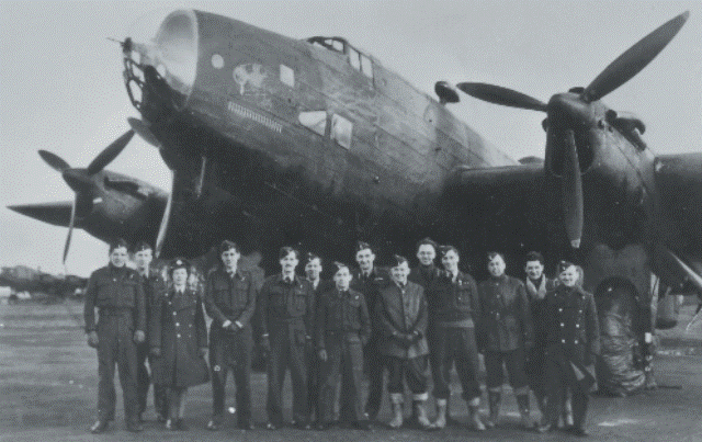 Halifax Mk. V, LL235, 77 Squadron, Royal Air Force, with crew and ground personnel in April 1944