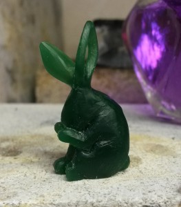 carving a rabbit pendant in wax