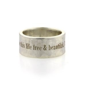 A silver ring laser engraved around the outside