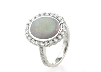 opal and diamond halo engagement ring