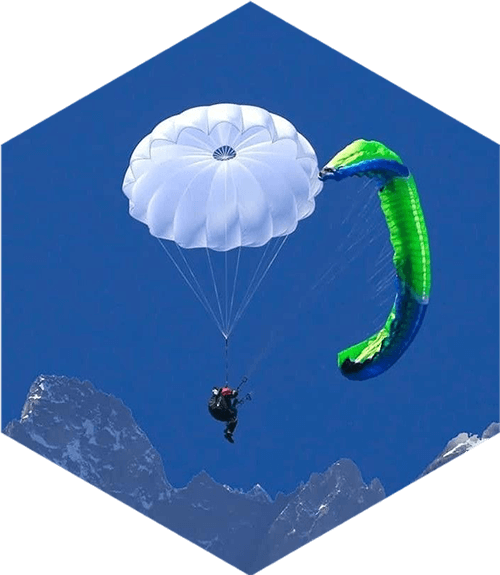 paraglider with white parachute open