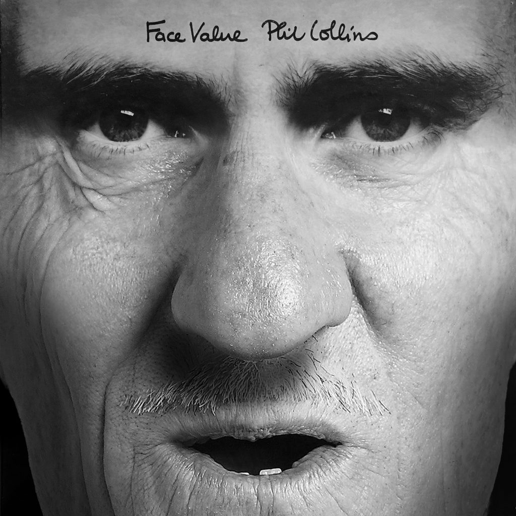The album cover to Phil Collins' "Face Value" with most of his face replaced by Barry Chuckle.