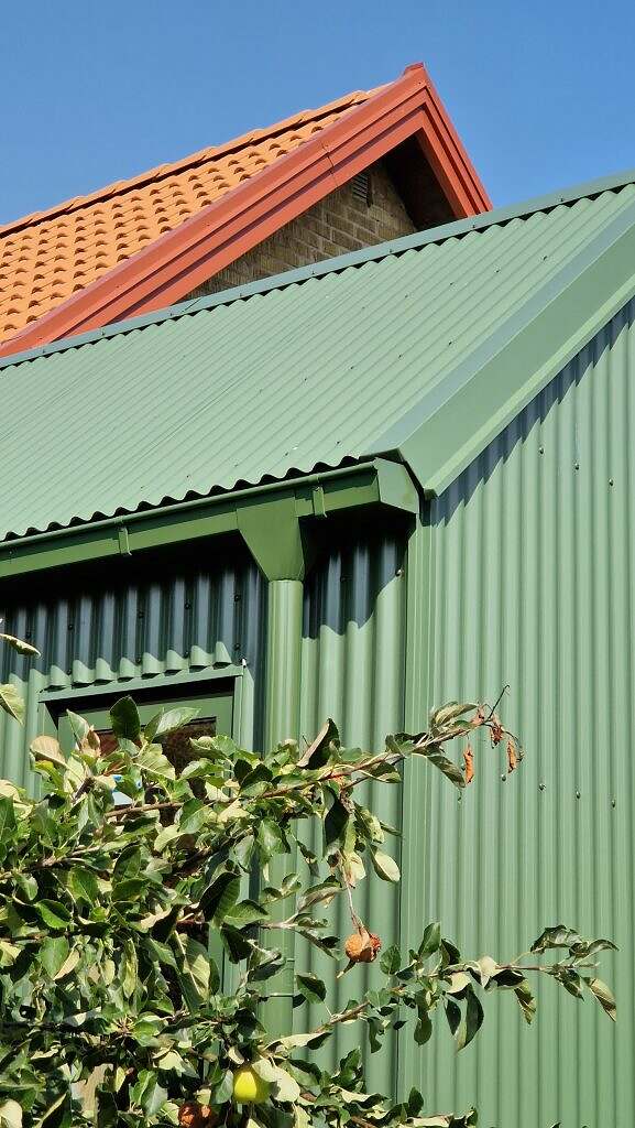 tillbyggnad grön sinusplåt