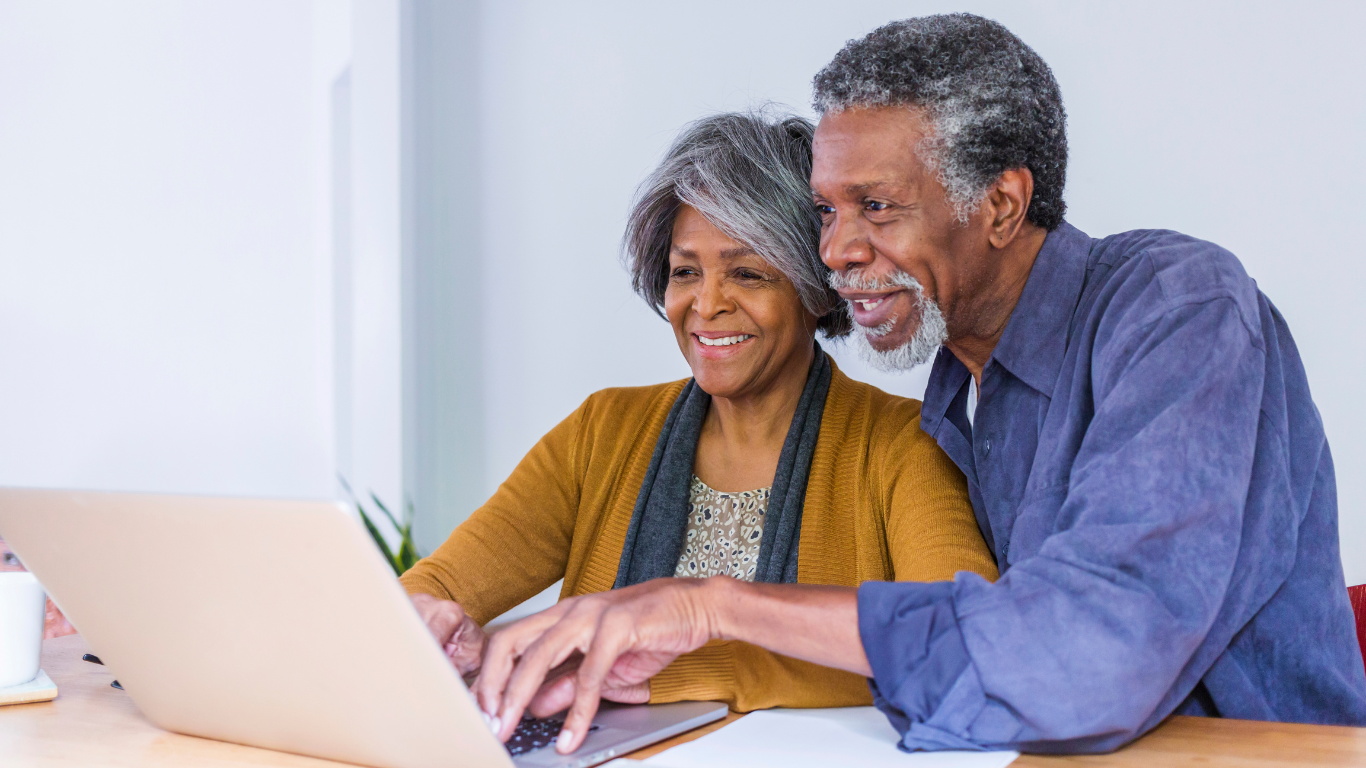 https://usercontent.one/wp/www.allevoyage.com/wp-content/uploads/2023/10/African-American-Old-Couple-making-Travel-Reservations-on-their-laptob-Allevoyage.png