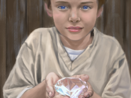 A boy holding a crystal