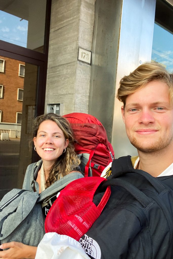 Wessel and Amber carrying backpacks interrail trip