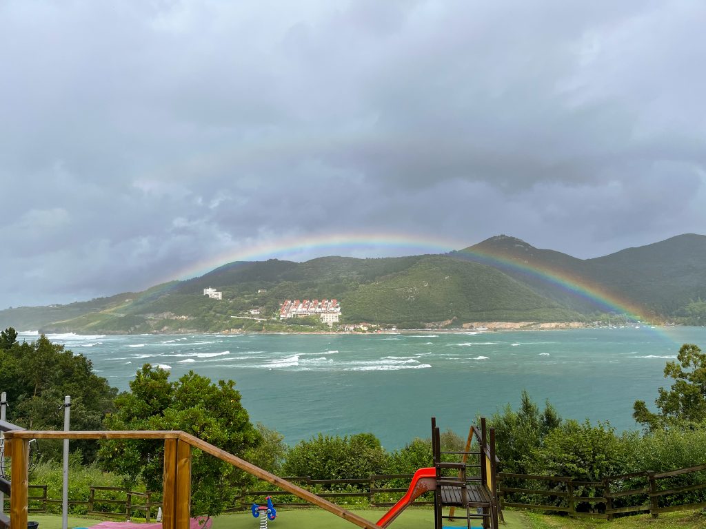 Rainbow above the bay of Mundaka, Spain