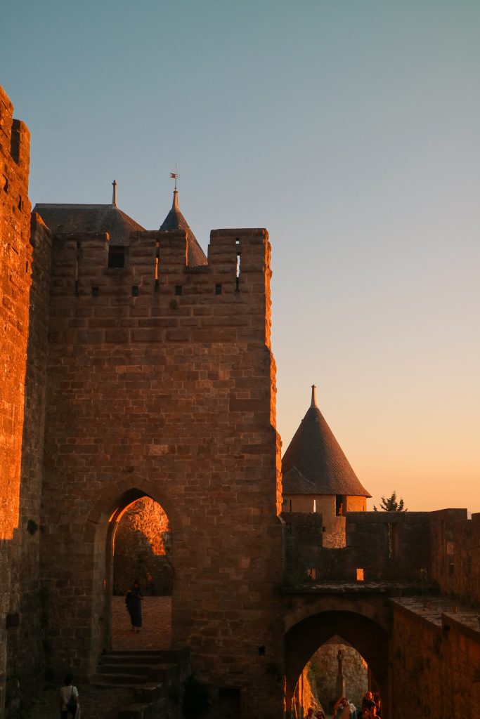 View of Carcassonne's towers and city wall at sunset