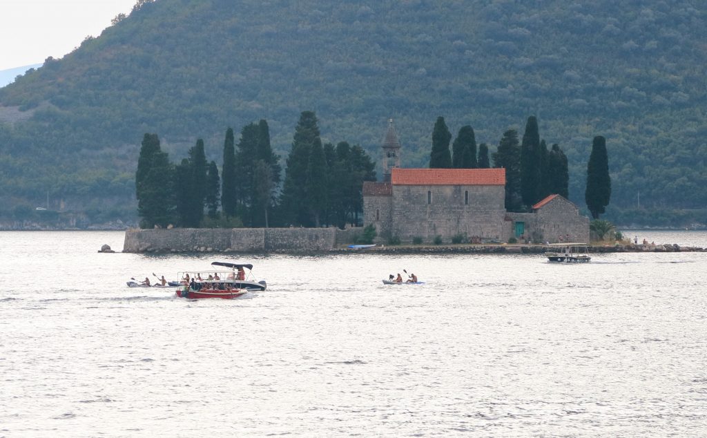 Boats near monestary in Kotor Bay, Montenegro