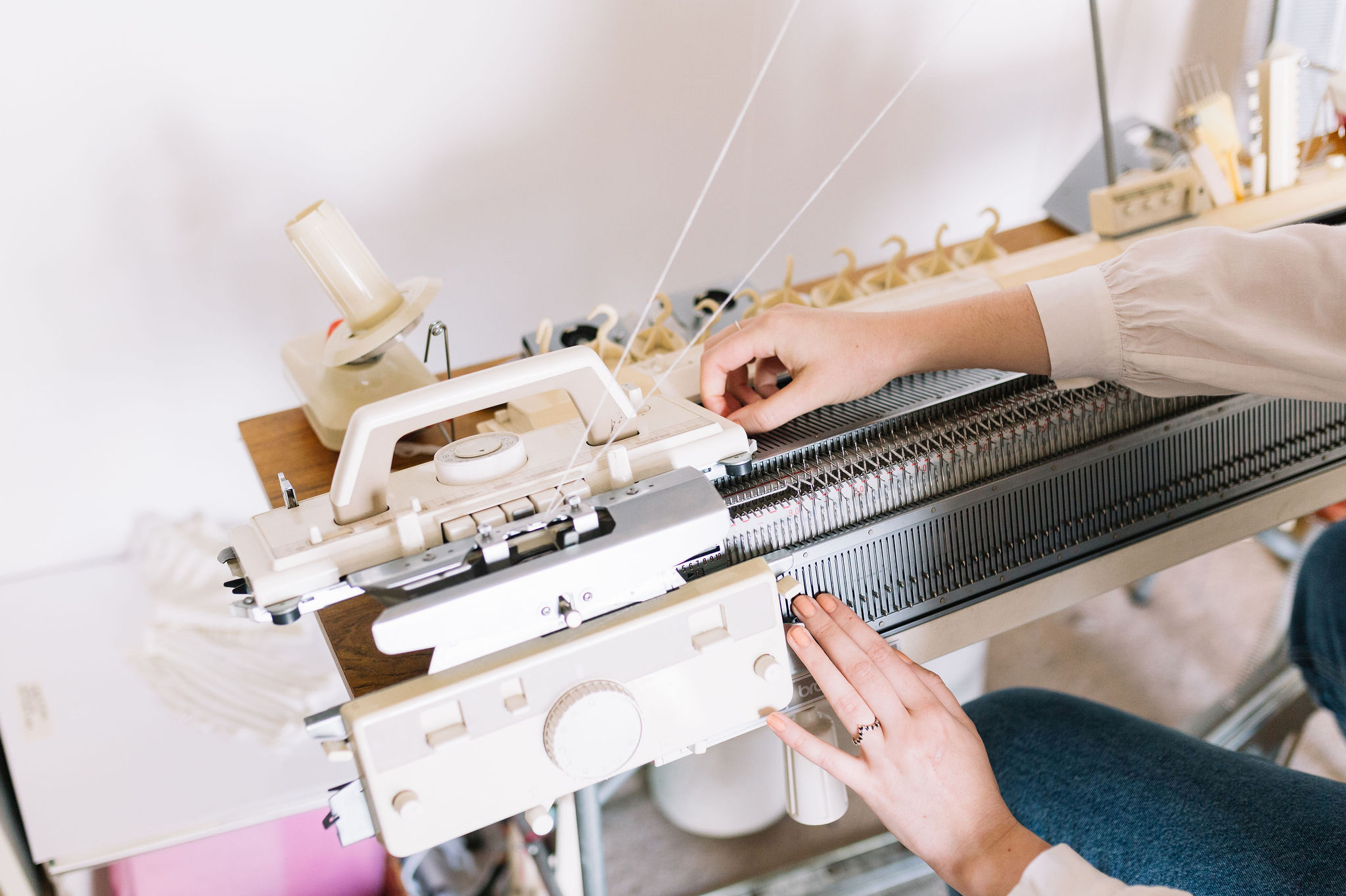 brother knitting machine with ribber being operated by Amber Hards