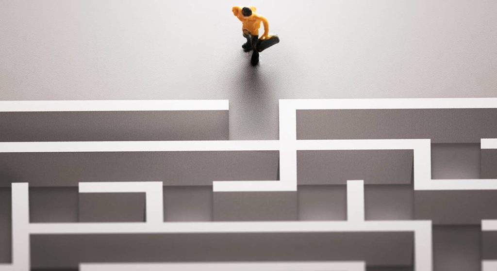 Man facing a maze