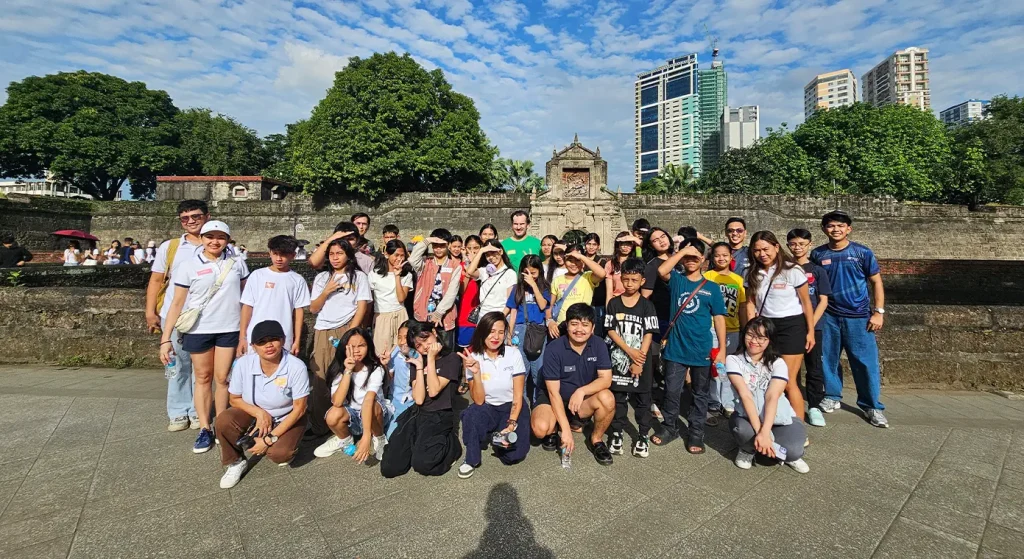 DST and AMCO Manila Leaders Peter, Paolo and Vanessa with the kids from BYSMP Foundation