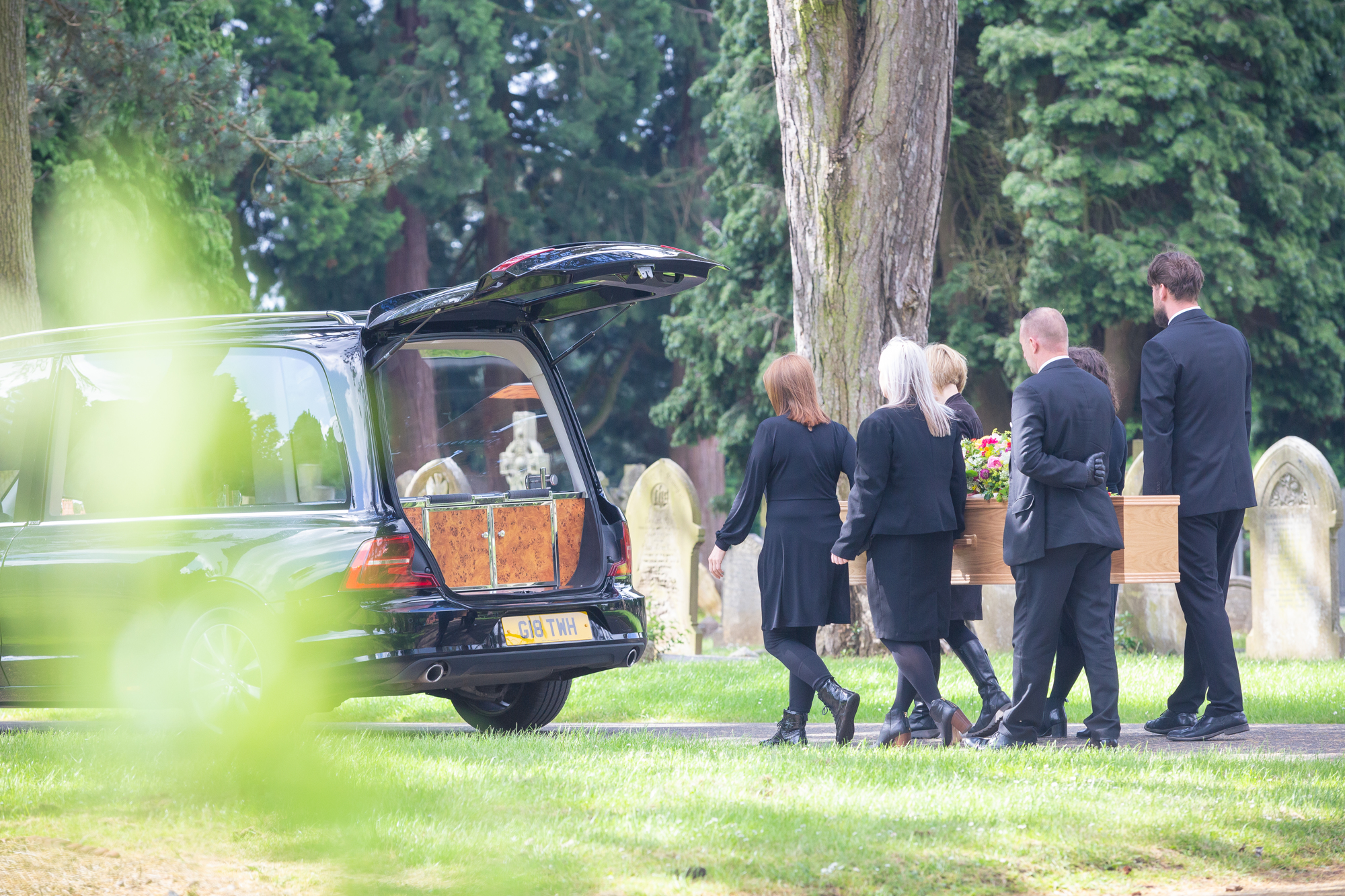 Image of coffin and flowers