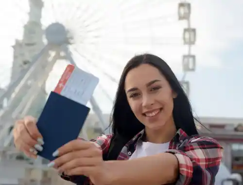 portrait-smiling-woman-showing-air-ticket-passport-2