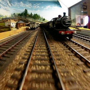 train eye view with locomotive passing to the right