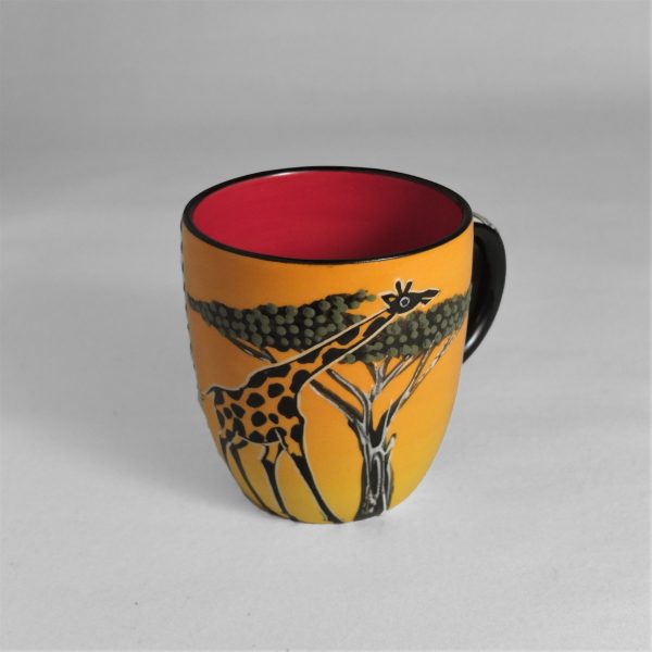 Vacker kopp giraff med träd