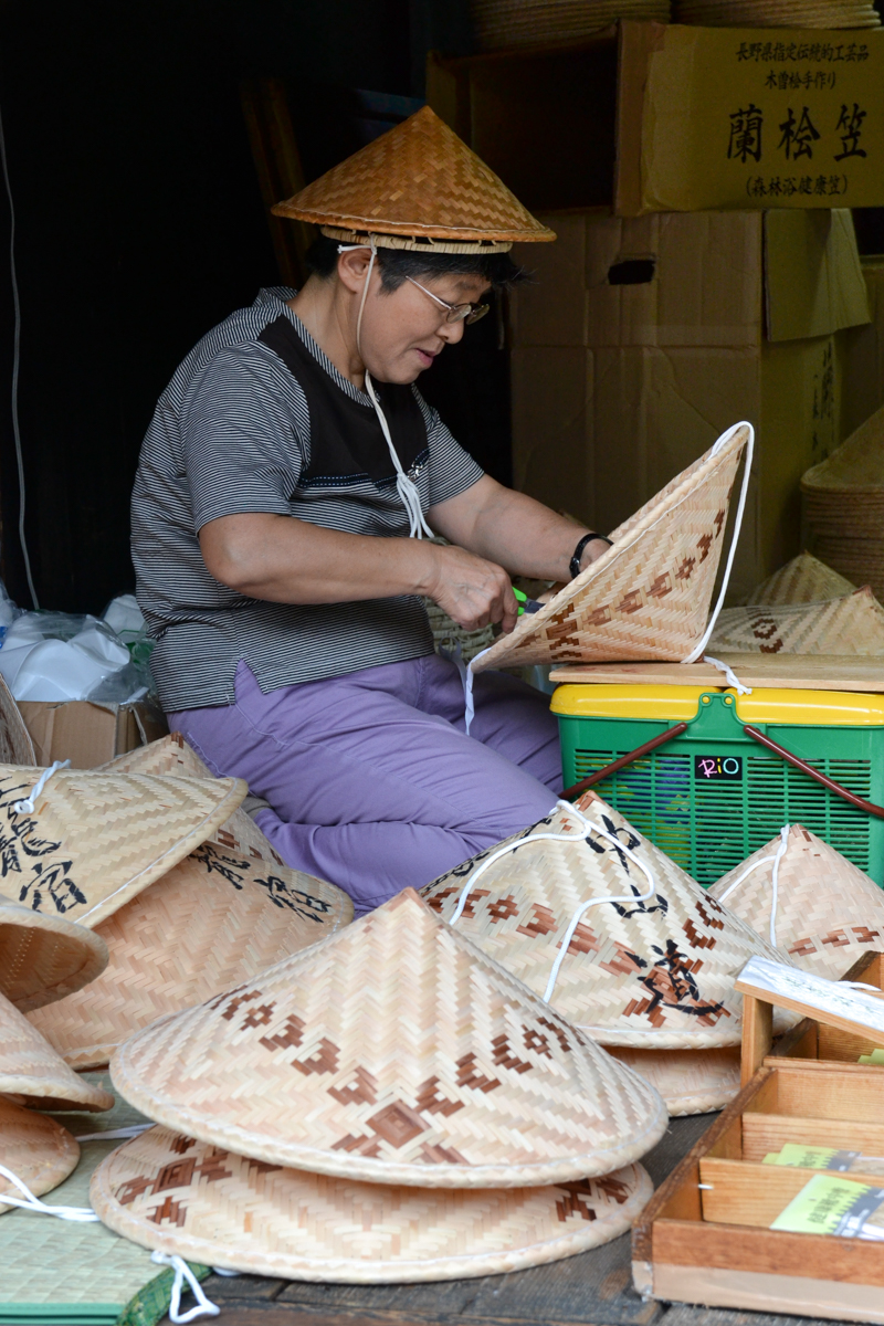 Japan – Making reed hats younger woman