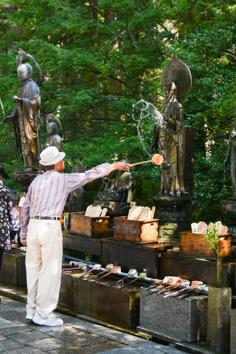 Japan – Man offering water