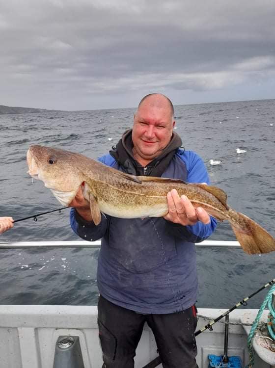 Fisherman with very large fish