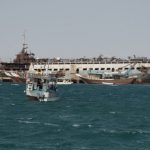 Small boats and old wrecked ships litter the harbor of Berbera, Somaliland, Aug. 16, 2016. (J. Patinkin/VOA)