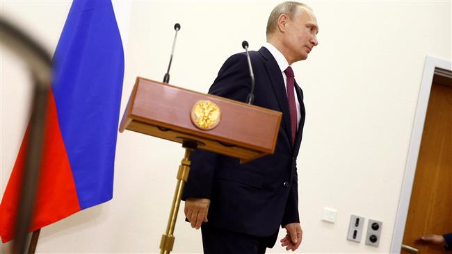 Russian President Vladimir Putin attends a press conference after a meeting with German Chancellor Angela Merkel in Berlin, Germany, October 20, 2016. (Photo by Reuters)
