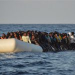 The photo shows refugees on a rubber boat before being rescued in the Mediterranean Sea, November 3, 2016. (Photo by AFP)