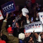 Supporters of Trump celebrate during election night at the New York Hilton Midtown in New York on November 9, 2016. (Photo by AFP)