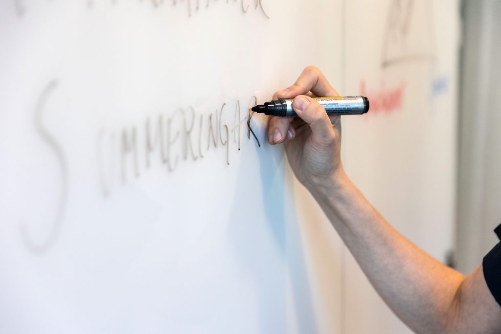 Writing a text on a white board